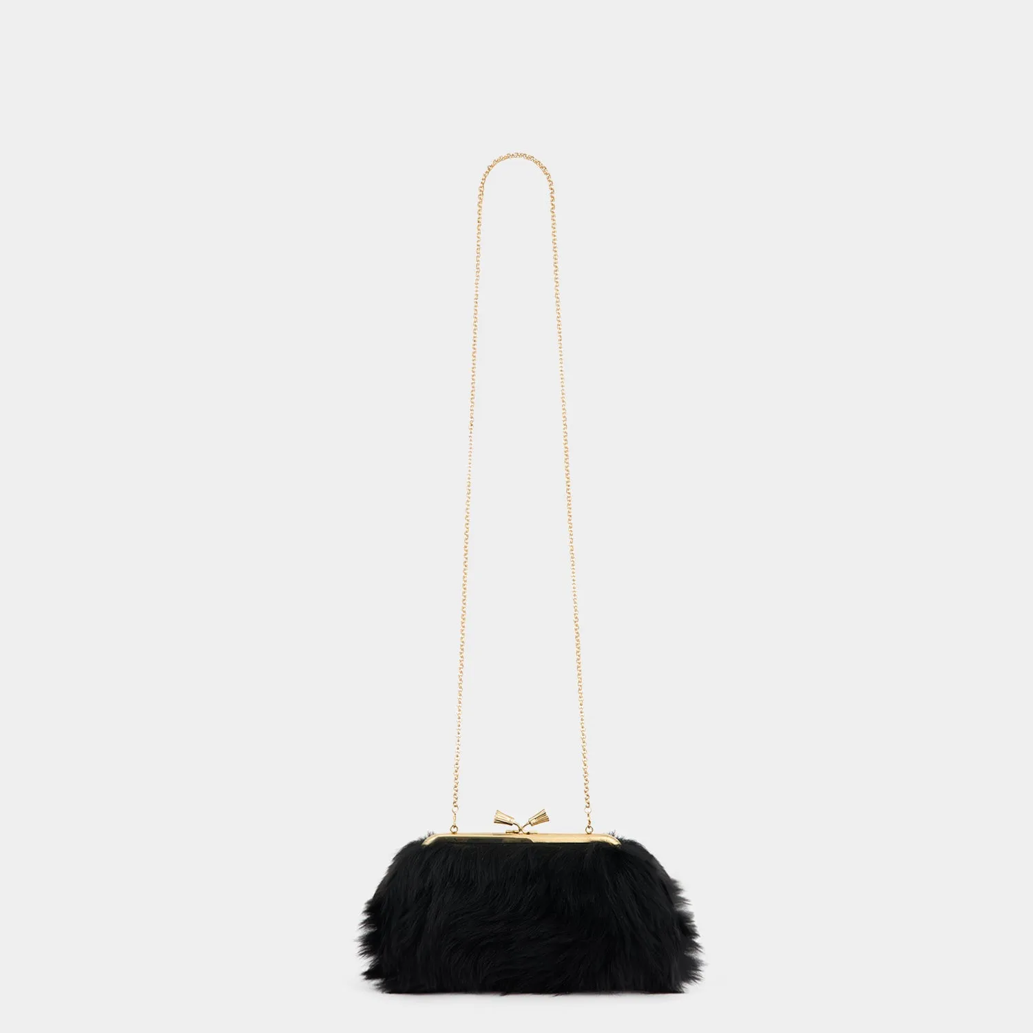 Maud Shearling Tassel Clutch