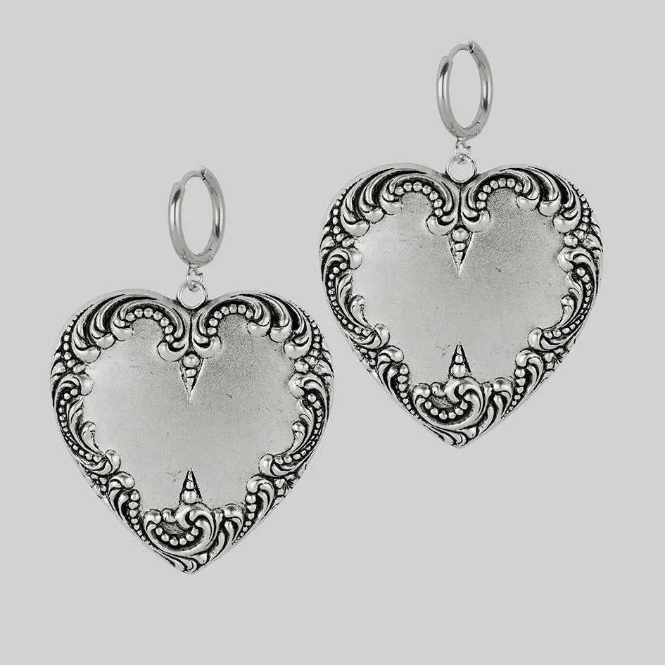 PORTRAIT. Ornate Heart Hoop Earrings - Silver